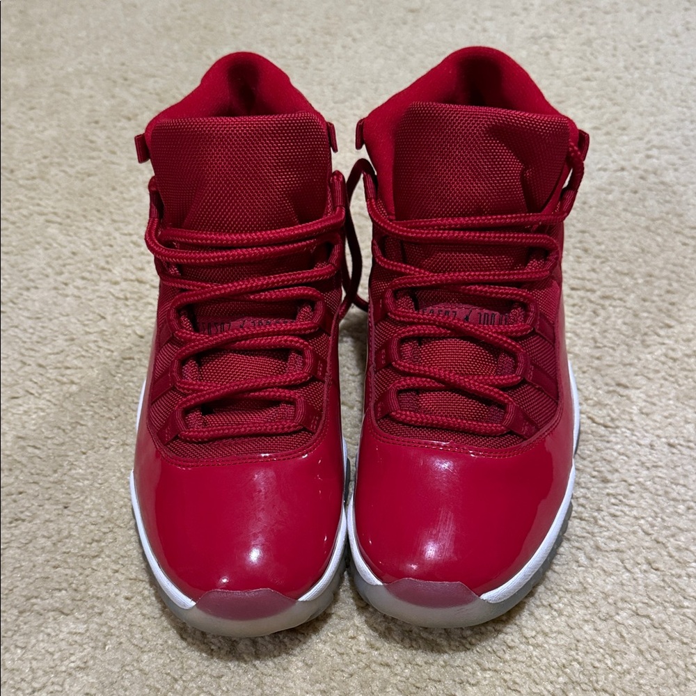 Jordan 11’s Size 10.5. Red and White